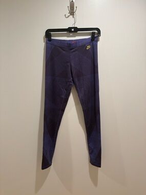 Nike Purple Active Leggings with Yellow Swoosh Detail
